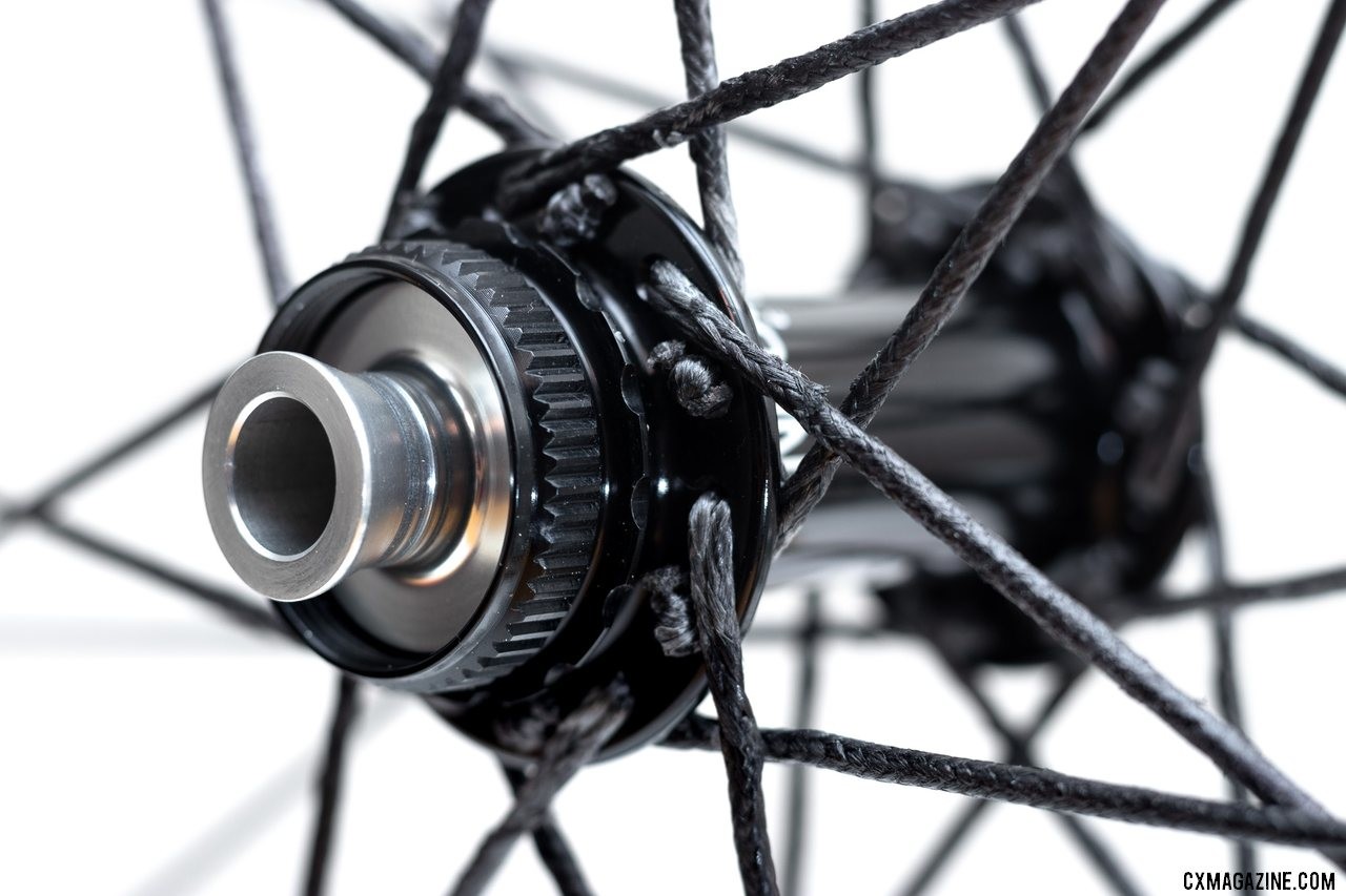 Berd spokes are still laced and crossed in a traditional fashion. Industry Nine Centerlock hubs feature compatibility with a variety of axle systems. Atomik's Ultimate Berd carbon tubeless wheels with Berd polyethylene spokes. © Cyclocross Magazine