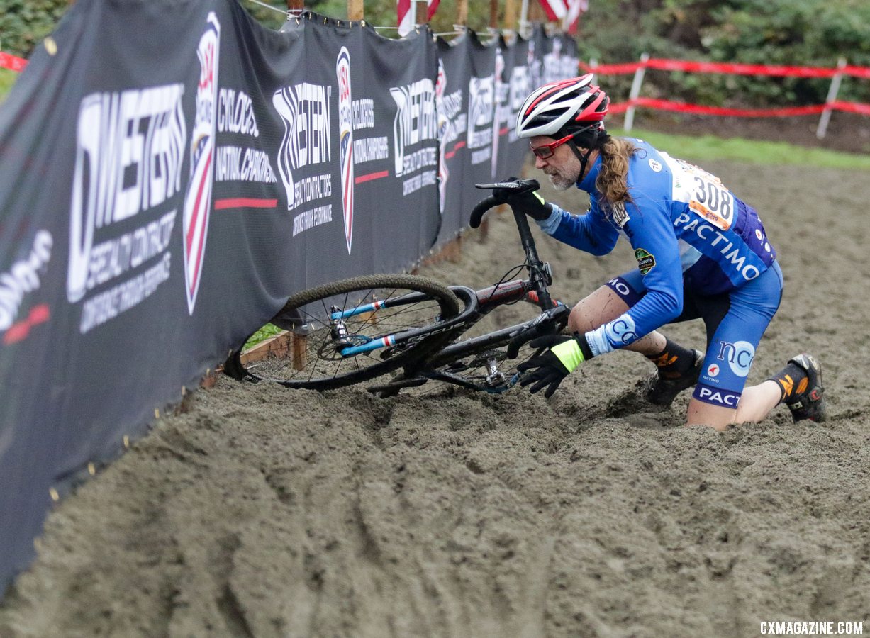 David Goodwin took a tumble in the sand pit. Masters Men 65-69. 2019 Cyclocross National Championships, Lakewood, WA. © D. Mable / Cyclocross Magazine