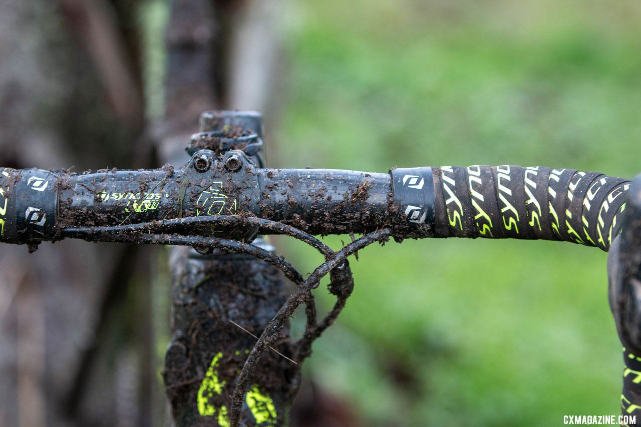 An in-line cable adjuster is part of a tidy and muddy race bike cockpit. Caleb Thompson's Masters 35-39-winning Scott Addict CX Cyclocross bike. 2019 USA Cycling Cyclocross National Championships bike profiles, Lakewood, WA. © A. Yee / Cyclocross Magazine