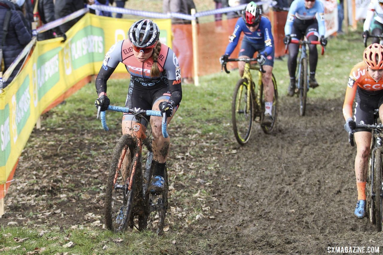 Rebecca Fahringer powers up one of the slick rises. 2020 World Cup Nommay, France. © B. Hazen / Cyclocross Magazine