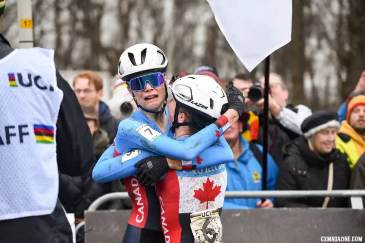 Ava Holmgren celebrates her sister Isabella's win. Junior Women, 2023 UCI Cyclocross World Championships, Hoogerheide. © B. Hazen / Cyclocross Magazine