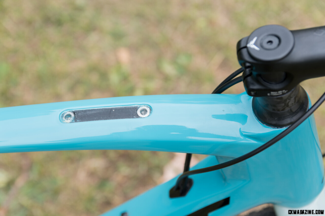 These mounts for a top tube bag have a rubber cover when not used. Felt Breed Carbon. ©C. Lee/Cyclocross Magazine