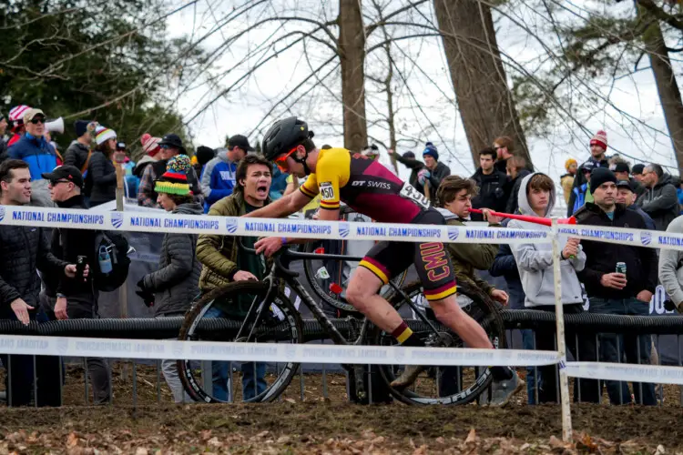 Luke Elphingstone (Colorado Mesa University) pushes his bike as he’s heckled by fans during the 2024 USA Cycling Cyclocross National Championships bicycle race at Joe Creason Park in Louisville, Kentucky. Saturday, December 14, 2024. Photo: Jason Whitman/Whitfoto.com